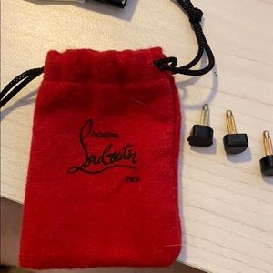 Louboutin mini dust bag with heel taps